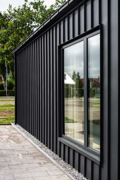 Tilbygning i stål og træ skaber ekstra plads til ”udlån” på Risskov Bibliotek, Risskov Bibliotek - Fortebakken 1, 8240 Risskov